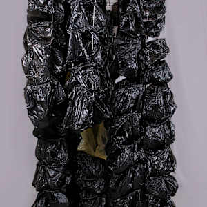 We Trusted, So We Gave You Our Hearts, Gathered in a Bag, and We Waited (About Black and the Bag Wall Series) by Amarachi Okafor (Orie) 