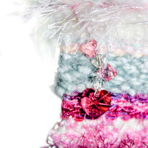 Pretty in Pink Mini Art Tapestry by Annette  Image: S Crystals repurposed. You can no longer advertise these crystals by name but their quality still graces prices of art. Textures of yarn vary giving this tapestry a unique background for these jewelry pieces. 