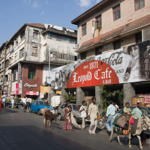Rural Family Near Leopold Cafe, Mumbai (2006) by Sanjay Marathe