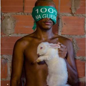 Baratino (William com coelho e colete de obreiro de igreja universal) (2018) by Adriano Machado