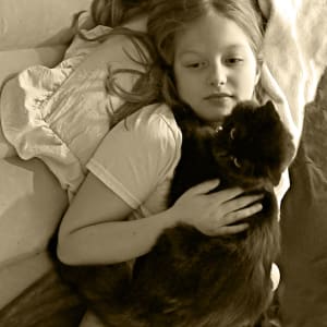 Girl with Cat by Darlene Alexander
