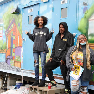 Sierra Club Mural by Young Artist Movement (YAM), Journey Allen, Kentrice Schexnayder  Image: YAM artists at mural unveiling (photo credit Patrick Niddrie)