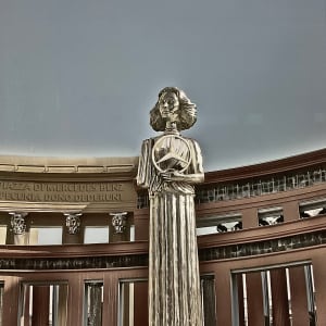 Statue in plaza by UNKNOWN