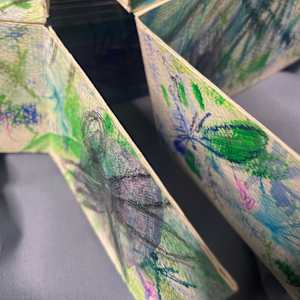 Dragons - Fly by Susan Detroy  Image: In a folded position 