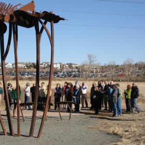 Flood Story by ECOS Communications, Inc.  Image: "Flood Story" sculpture, by ECOS Communications, Inc., shown at dedication, on February 23, 2011