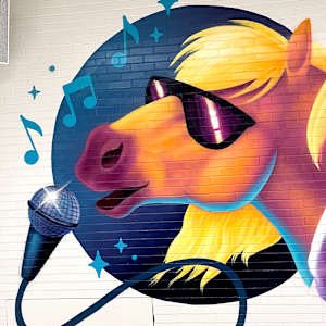 Be Herd by Julia Williams, The Designosaur  Image: Close up of left-hand side of mural: horse with microphone 