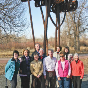 Flood Story by ECOS Communications, Inc.  Image: "Flood Story" sculpture, by ECOS Communications, Inc., shown at dedication, on February 23, 2011.  Left to right: Ellen Belef, Arapahoe County Open Space & Trails Advisory Board; SSPR Board Member Sue Rosser; Marc Scott, Arapahoe County Open Space & Trails Advisory Board; SSPR Board Members Pam Eller and John Ostermiller, Mayor Doug Clark, SSPR Board Member Kay Geitner, Mayor Pro Tem Debbie Brinkman, Arapahoe County Commissioner Susan Beckman, and Council Member Peggy Cole.
