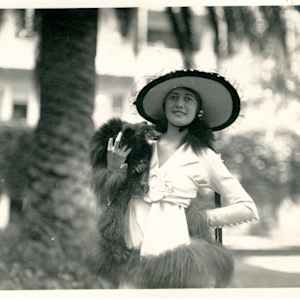 Art Outside the Box Take 2: Avenida del Sol & Orange Avenue by Sophia Hodges, Rebekka Siqueiros  Image: A woman in an early fashion shoot, titled a “Style Show” in the courtyard of the Hotel del Coronado. Date unknown. Coronado Historical Association Collection. Rights reserved.