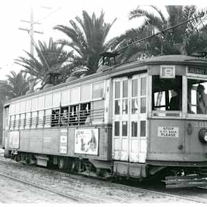 Art Outside the Box Take 2: 4th and Orange Avenue by Griffen Wong, Juniper Clark  Image: The trolley ran down the center of Orange Avenue from the ferry landing to Tent City, a significant part of island transport in the decades before the bridge was built. Date unknown. Coronado Historic Association Collection. Rights reserved.