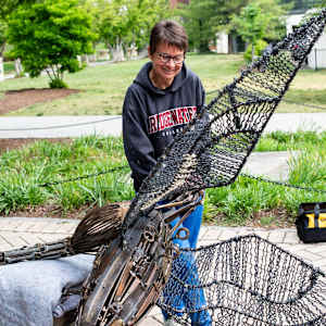 Painting the Pileated Woodpecker by Karen Pannabecker  Image: Painting the Pileated Woodpecker by Karen Pannabecker (installation image).