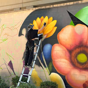 Pearl Fu Plaza Mural (Untitled) by Wingchow (Christina Wing Chow)  Image: Wingchow at work on the untitled mural.