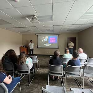 Mind Started Rambling by Dylan Collins  Image: Dylan Collins presenting his work at a public talk at the Raleigh Court Library.