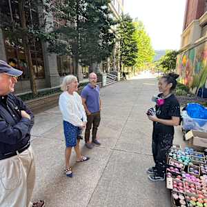 Pearl Fu Plaza Mural (Untitled) by Wingchow (Christina Wing Chow)  Image: The artist (right) with (from left) Bob Kaplan and donor Deborah B. Kaplan and Joshua Shreeman, son of the late Karen Shreeman.