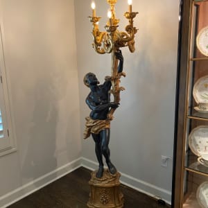 Pair of Polychrome Decorated and Gilt Carved Blackamoor Figural Floor Chandeliers