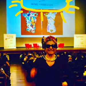Autobiographic Pictures by Renee Fabbiocchi  Image: 2023, San Remo - At last, I celebrate in the famous Ariston Theater in San Remo the Victory of my "GODS of the SACRED FIRE." These Gods have been chosen by a Cultural Association to represent the CUSTODY of SACRED VALUES!

2023, Sanremo - Finalmente celebro nel famoso Teatro Ariston di Sanremo la Vittoria dei miei "DEI del SACRO FUOCO". Questi Dei sono stati scelti da una Associazione Culturale a rappresentare la CUSTODIA dei VALORI SACRI!