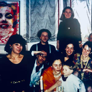 Autobiographic Pictures by Renee Fabbiocchi  Image: 1992, Munich - This photo captures the birthday of my son Davide, celebrated at Carla M.'s house. 
A group of close friends (Antonella Villa, now Sister Edith, Piroschka and Ugo Dossi, Felix and Elena Alvarez) shared this special moment with Davide and me. Carla, originally from Abruzzo, was the gallery owner who sold many of my works when I returned to Munich after fleeing from Praiano, Positano.
She had her own background in advertising graphics and greatly appreciated when, on the advice of a gallery owner from Pescara, Cesare M., I went to visit her. I provided her with psychological stability in exchange for financial support

1992, München - Questa foto ritrae il compleanno di mio figlio Davide festeggiato a casa di Carla M. Un gruppo di amici più stretti (Antonella Villa, ora Suora Edith, Piroschka e Ugo Dossi, Felix ed Elena Alvarez) condivide questo momento speciale con me e Davide. Carla, abruzzese, era stata la gallerista che mi aveva venduto tante opere quando fuggendo da Praiano, Positano, ero tornata a München. 
Vantava un suo curriculum di grafica pubblicitaria e amò moltissimo quando su consiglio di un gallerista di Pescara, Cesare M., andai a trovarla. Le davo stabilità psichica in cambio di sostegno economica. 