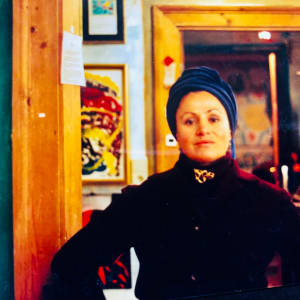 Autobiographic Pictures by Renee Fabbiocchi  Image: 2006, Munich - This image belongs to the last experiences I had at my beloved Museum of the Soul and Bank of Spiritual Values. I could not bear the violence I was subjected to in the face of the sale of my beloved Sacred Space. In my eyes, you can see almost a question directed at God and the Universe, and a plea. But unfortunately, I had to swallow the poisons of injustice.
My museum was brutally sold, and I fell ill with strong pains at the Sacrum. Only an invitation to exhibit in Venice with Matteo Lo Greco and the project to present "Metamedicine"*—through which I had managed to heal myself—even at the UN Palace in New York, lifted me out of that terrible depression!
(*) Through intuition and confirmation from Louise Hay, I had long experienced the HEALING POWER of Art. In fact, since I was a child, I had known how to transform Pains into Paintings of Joy. I made enlarged photocopies (over 100) of the X-rays of my Sacrum, and every day for about three months, I managed to apply on them the Energy of my Heart that wanted to heal. The effect was miraculous: my Consciousness and Awareness had managed to change and transform the very chemistry of the disease into confirmed healing! I recommend it to everyone, just as Jean-Paul Sartre's book "The Imaginary". 

2006, München - Quest'immagine appartiene alle ultime esperienze vissute nel mio amato Museo dell'Anima e Banca dei Valori Spirituali. Non sopportavo la violenza in cui ero stata imprigionata di fronte la vendita del mio amato Spazio Sacro. Nei miei occhi quasi un interrogativo rivolto a Dio e all'Universo ed un'implorazione. Ma purtroppo dovetti ingoiare i veleni delle ingiustizie. 
Il mio Museo fu venduto brutalmente ed io mi ammalai all'Osso Sacro. 
Soltanto un invito ad esporre a Venezia con Matteo Lo Greco ed il progetto di presentare la "Metamedicina"*, con cui ero riuscita a guarirmi, addirittura al Palazzo dell'ONU a New York mi spostarono da quella terribile depressione! 
(*) Per intuizione e per conferma di Louise Hay avevo sperimentato da tempo la FORZA GUARENTE dell'Arte. Difatti sin da bambina avevo saputo trasformare i Dolori (Pains) in Disegni di GioJa (Pain.tings). Feci delle fotocopie ingrandite (più di 100) delle lastre del mio Osso Sacro e ogni giorno per circa tre mesi riuscii ad investirci sopra l'Energia del mio Cuore che voleva guarire. L'Effetto fu miracoloso: la mia Coscienza e Consapevolezza aveva saputo cambiare e trasformare la chimica stessa della malattia in affermata guarigione! Lo consiglio a tutti, così come il libro di Jean-Paul Sartre "Immagine e Coscienza". 