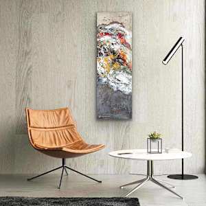 Autumn Wind by Shirley Williams  Image: Autumn Wind shown hung beside orange leather chair