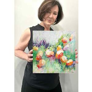 Chromatic Landscape 1 by Shirley Williams  Image: Artist holding Chromatic Landscape for scale