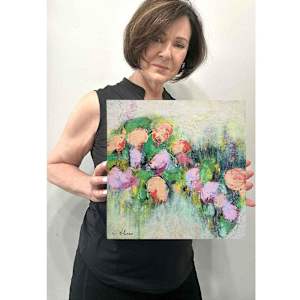 Chromatic Landscape 2 by Shirley Williams  Image: Artist Shirley Williams holding Chromatic Landscape for scale