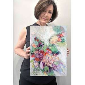 Flower Power Study 1 by Shirley Williams  Image: Artist Shirley Williams holding Flower Power Study 1 to show scale