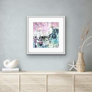 Pink Sunrise by Shirley Williams  Image: Pink Sunrise shown framed over side table