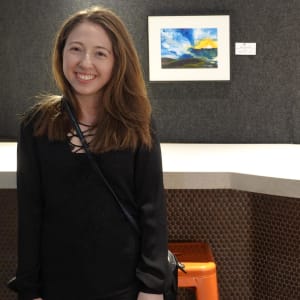 Walked for Miles to Find This Edge by Nicole Sylvia Javorsky  Image: Nicole and her painting at Gallery Clarendon