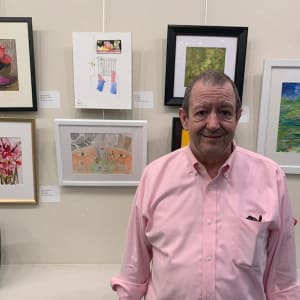 BBC News by Paul Shain  Image: Artist and painting at the Water Color Art Society - Houston gallery