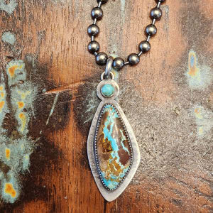 "Butterfly Wing Pendant" - Natural Thunderbird Turquoise with Kingman Accent in Sterling Silver by Shasta Brooks  Image: All Art © Shasta Brooks Studio LLC
