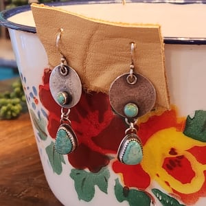 "Rustlerina Earrings" - Asymmetrical Kingman Turquoise Drops Sway from Rustic Discs on French Wires by Shasta Brooks  Image: All Art © Shasta Brooks Studio LLC