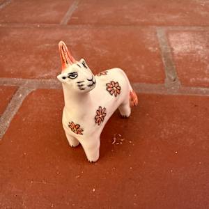 Red Daisy Cat Cream Supreme, a teenie by Nell Eakin 