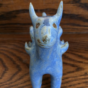 Spike the blue tufted dog by Nell Eakin 