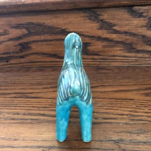 Happy Turquoise Flower critter, with long hair by Nell Eakin 