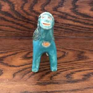 Happy Turquoise Flower critter, with long hair by Nell Eakin 