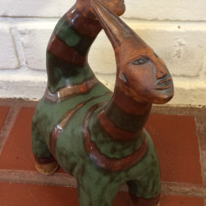 Hugo and Immy,  a green striped 2 headed unicorn by Nell Eakin 