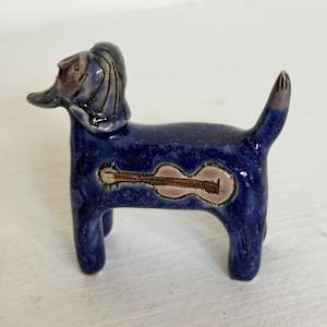 Sharp Blue Guitar Man,  a teenie by Nell Eakin 