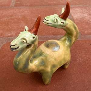 Mossy Green Double Dino, a teeny double unicorn by Nell Eakin 
