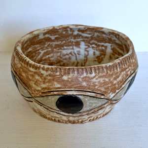 Eyes flower pot by Nell Eakin 