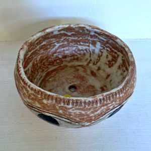 Eyes flower pot by Nell Eakin 