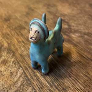 Blue Gem, a flying  teenie lion for truth and justice by Nell Eakin 