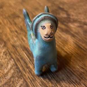 Blue Gem, a flying  teenie lion for truth and justice by Nell Eakin 