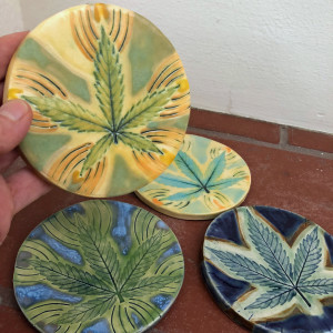 Trail Blazer, and other coasters by Nell Eakin 