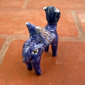 Eye on the Flyen Lion, in purple by Nell Eakin 