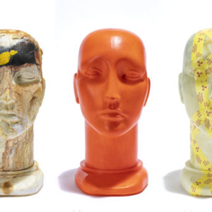 Seven Heads referencing uranium and radioactivity. by Mary Lou Dauray