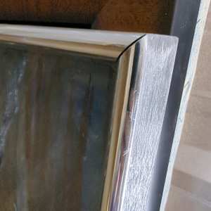 Unto Us by Miriam McClung  Image: Corner of painting and frame - front.