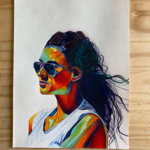 Festive by Renee Reid  Image: This colorful original drawing titled Festive by Renee Reid is one of three artworks of a woman in sunglasses looking out into the distance. She is introspective, peaceful and a bit festive with the colors selection. 

This one-of-a-kind colored pencil drawing will bring you into a thoughtful place and give you a sense of strength with a touch of adventure.