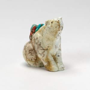 Fred Bowannie: Seated Bear with Bundle, Magnesite by Fred Bowannie (1950-)  Image: Fred Bowannie: Seated Bear with Bundle, Magnesite