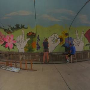 Love Other Mural (Paint Parker Murals) by Lutheran High School Art Students  Image: LuHi students helped beautify the bike trails in Parker by creating the "Love Others" mural, located under the bridge at Willow Park Drive and Main Street on the Sulphur Gulch Trail. This project was led by LuHi Junior Mathew Fasone. Be sure to swing by today, say hi to the artists, and check it out!