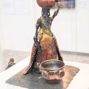 Woman with Basket by Yvonne Stubbs
