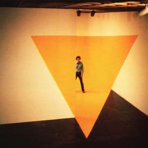 Yellow Triangle by Buky Schwartz